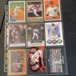 12 Derek Jeter MLB Baseball Cards and 1 postcard (O)